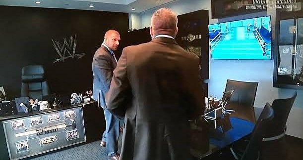 Triple H in his office with Ultimate Warrior